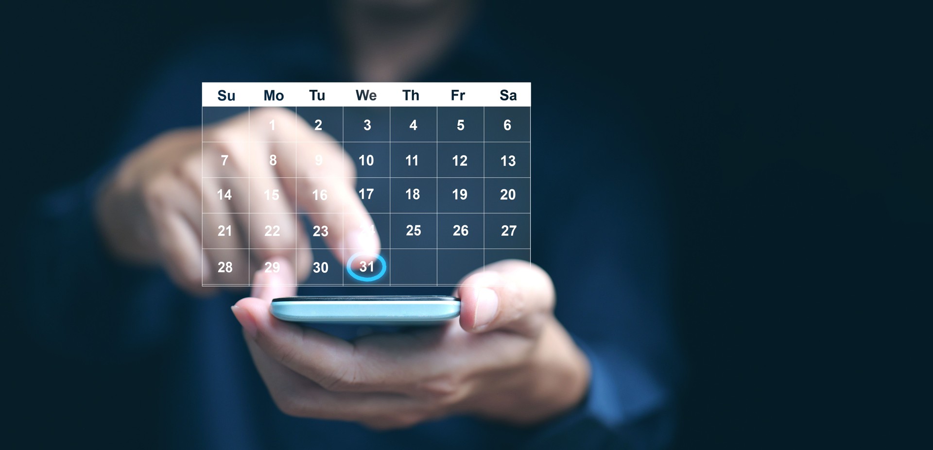 Planning and time management concept. A man manages his time using calendar interface on his smartphone